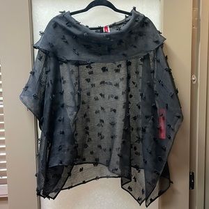 Unworn with tags. IC by a Connie shirt. Bought for 140. Size medium.